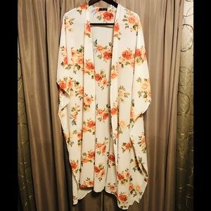 A floral brunt orange kimono 😀